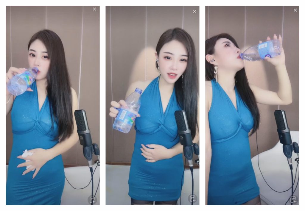 蓝色紧身衣黑丝主播撑大肚子